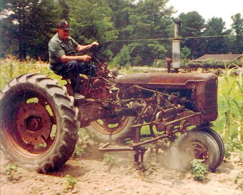 Papa Farming on the 1942 Farmall Pictures, Images and Photos