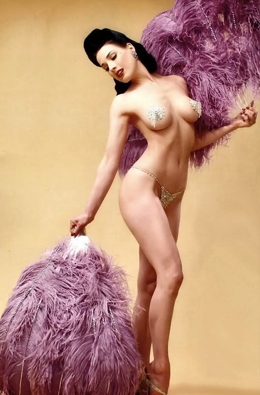 Dita Von Teese With Purple Feathers Pictures, Images and Photos